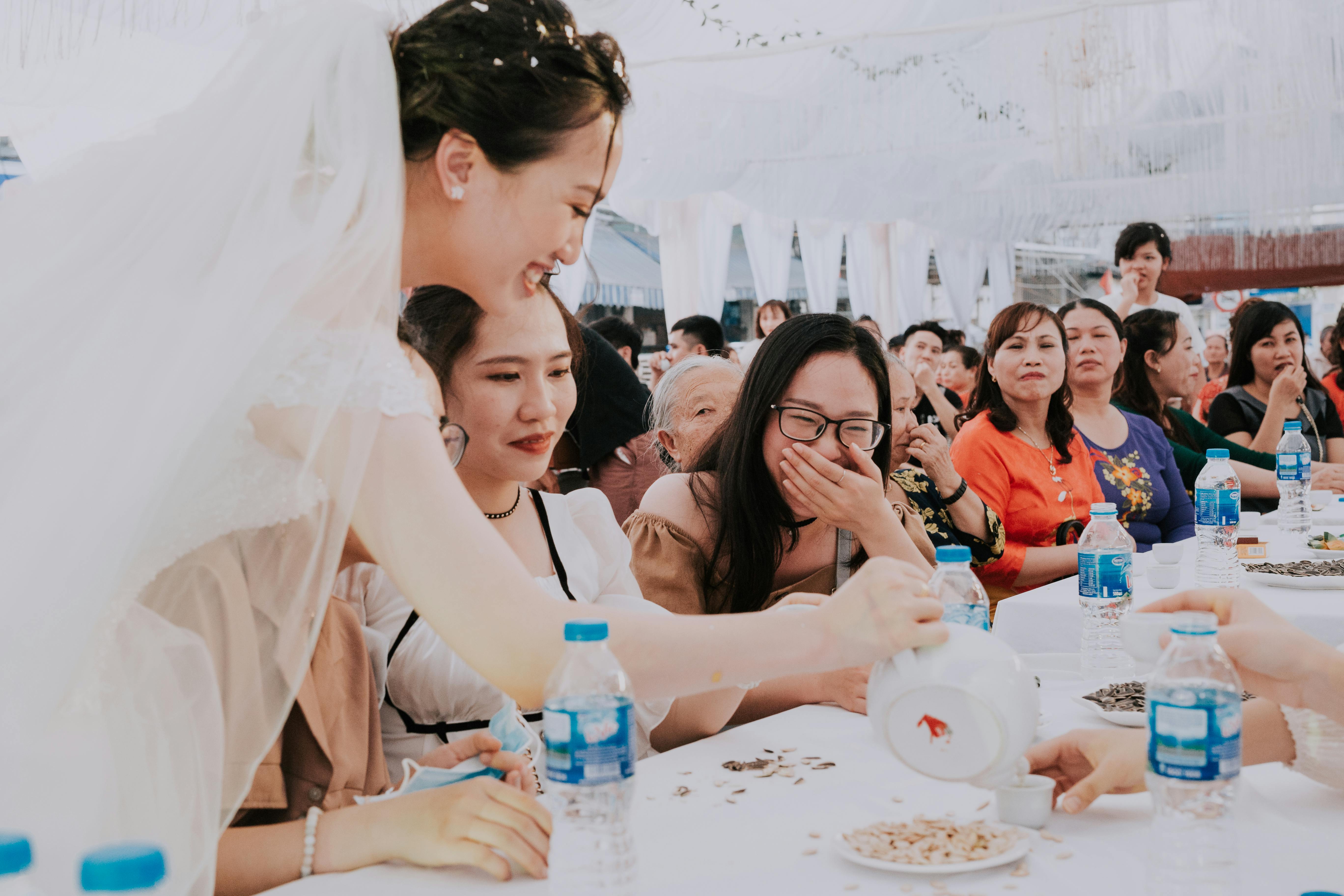 People enjoying a tent celebration
